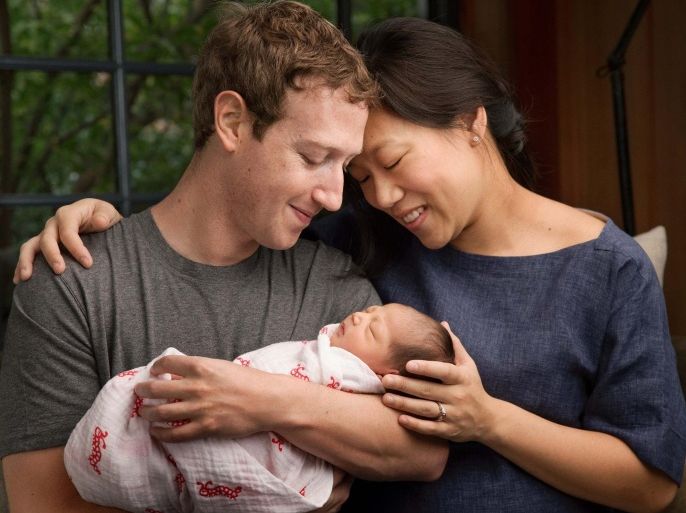 Facebook Inc. Chief Executive Mark Zuckerberg and his wife Priscilla are seen with their daughter named Max in this image released on December 1, 2015. Zuckerberg and his wife said they plan to give away 99 percent of their fortune in Facebook stock to a new charity the couple were creating, while announcing the birth of their first child on Tuesday. REUTERS/Courtesy of Mark Zuckerberg/Handout ATTENTION EDITORS - THIS PICTURE WAS PROVIDED BY A THIRD PARTY. REUTERS IS UNABLE TO INDEPENDENTLY VERIFY THE AUTHENTICITY, CONTENT, LOCATION OR DATE OF THIS IMAGE. EDITORIAL USE ONLY. NOT FOR SALE FOR MARKETING OR ADVERTISING CAMPAIGNS. NO RESALES. NO ARCHIVE. THIS PICTURE IS DISTRIBUTED EXACTLY AS RECEIVED BY REUTERS, AS A SERVICE TO CLIENTS TPX IMAGES OF THE DAY