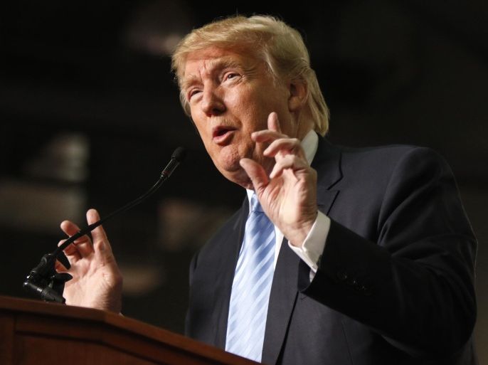 FILE - In this Nov. 23, 2015, file photo, Republican presidential candidate Donald Trump speaks in Columbus, Ohio. While the White House condemns Donald Trump's call for a ban on Muslim immigrants, President Barack Obama may only have himself to blame if a President Trump ever tries to put his plan into action. (AP Photo/Paul Vernon, File)