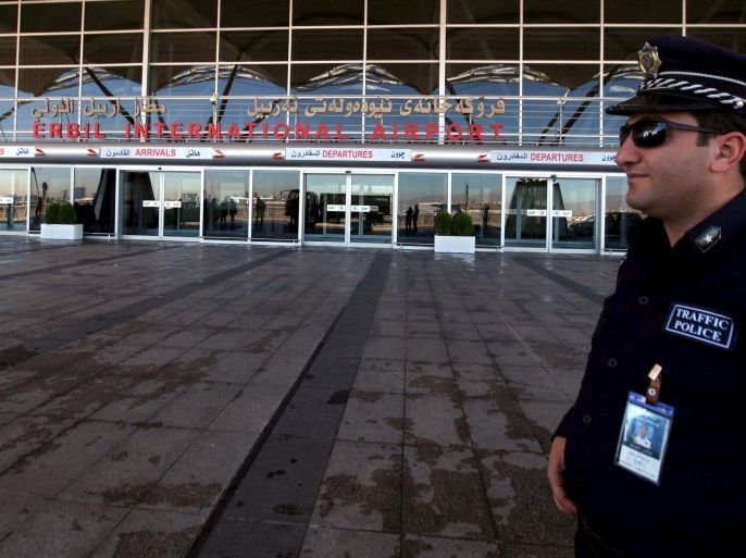 A Kurdish policeman stands guard at Arbil International Airport November 23, 2015. Iraq said it was suspending flights between Baghdad and the northern cities of Erbil and Sulaimaniya for two days starting on Monday due to military traffic from Russia's air campaign in neighbouring Syria. REUTERS/Azad Lashkari