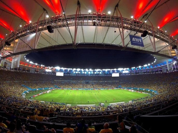 A general view over the stadium during the FIFA World Cup 2014 round of 16 match between Colombia and Uruguay at the Estadio do Maracana in Rio de Janeiro, Brazil, 28 June 2014. (RESTRICTIONS APPLY: Editorial Use Only, not used in association with any commercial entity - Images must not be used in any form of alert service or push service of any kind including via mobile alert services, downloads to mobile devices or MMS messaging - Images must appear as still images and must not emulate match action video footage - No alteration is made to, and no text or image is superimposed over, any published image which: (a) intentionally obscures or removes a sponsor identification image; or (b) adds or overlays the commercial identification of any third party which is not officially associated with the FIFA World Cup) EPA/MARCELO SAYAO