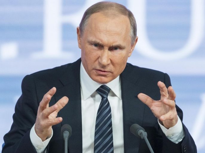 Russian President Vladimir Putin gestures during his annual news conference in Moscow, Russia, Thursday, Dec. 17, 2015. President Vladimir Putin says Turkey acted contrary to its own interests by downing a Russian warplane. Speaking at a televised news conference Thursday, Putin said that he sees no possibility of overcoming the diplomatic strain under the current Turkish leadership. (AP Photo/Alexander Zemlianichenko)