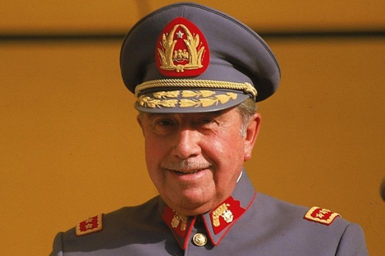 FILE - In this Oct. 1983, file photo, General Augusto Pinochet is seen in Santiago, Chile. Retired members of the armed forces and civilians commemorated Wednesday, Nov. 25, 2015, Pinochet's one hundredth birthday at the dictator's former summer retreat outside Santiago. Pinochet took power in a 1973 coup that deposed the democratically elected government of President Salvador Allende. (AP Photo/Di Baia, File)
