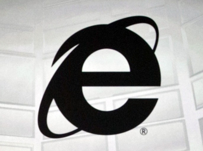 This June 4, 2012 photo shows the Microsoft Internet Explorer logo projected on a screen during the Microsoft Xbox E3 media briefing in Los Angeles. After 20 years of competing against rival web browsers, Microsoft is close to launching its own alternative to its once-dominant Internet surfing program. (AP Photo/Damian Dovarganes)