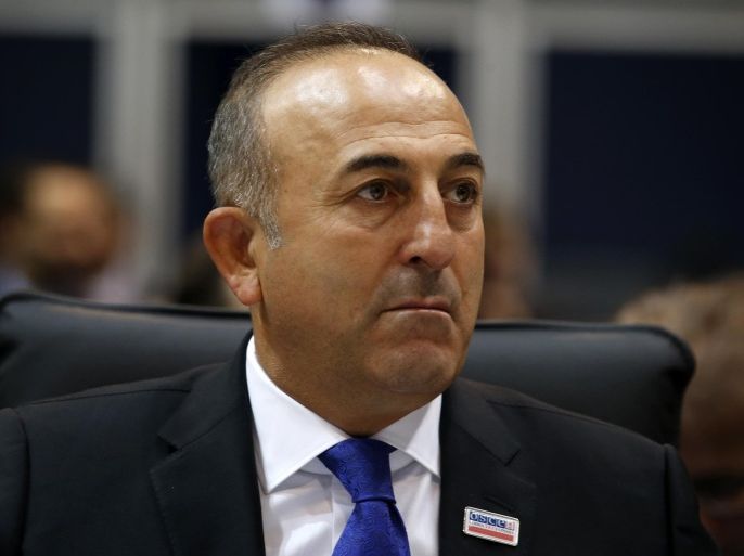 Turkish Foreign Minister Mevlut Cavusoglu attends at the opening session of the 22st OSCE Ministerial Council, in Belgrade, Serbia, Thursday, Dec. 3, 2015. Turkey's Foreign Ministry says the Turkish and Russian foreign ministers will meet on the sidelines of an Organization for Security and Cooperation meeting in the Serbian capital Belgrade. (AP Photo/Darko Vojinovic)