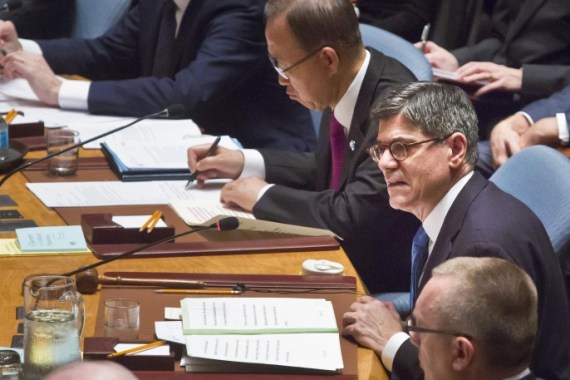 U.S. Treasury Secretary Jacob Lew, right, seated next to U.N. Secretary General Ban Ki-moon, center, addresses the United Nations Security Council, Thursday, Dec. 17, 2015. Finance ministers from the 15 nations on the U.N. Security Council are meeting, to adopt a resolution aimed at disrupting the outside revenue that the Islamic State extremist group gets from selling oil and antiquities, from ransom payments and other criminal activities. (AP Photo/Bebeto Matthews)