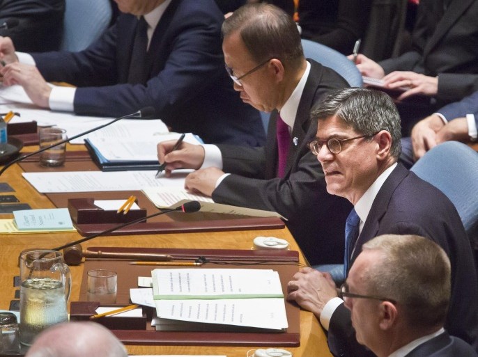 U.S. Treasury Secretary Jacob Lew, right, seated next to U.N. Secretary General Ban Ki-moon, center, addresses the United Nations Security Council, Thursday, Dec. 17, 2015. Finance ministers from the 15 nations on the U.N. Security Council are meeting, to adopt a resolution aimed at disrupting the outside revenue that the Islamic State extremist group gets from selling oil and antiquities, from ransom payments and other criminal activities. (AP Photo/Bebeto Matthews)