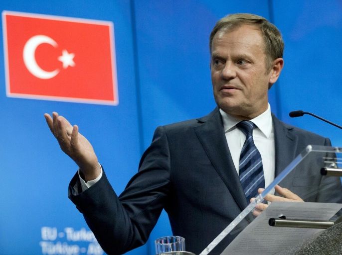 European Council President Donald Tusk speaks during a media conference at an EU-Turkey summit in Brussels on Sunday, Nov. 29, 2015. At a high-profile summit in Brussels on Sunday, European Union leaders will look to offer Turkey 3 billion euros ($3.2 billion), an easing of visa restrictions and the fast-tracking of its EU membership process in return for tightening border security and take back some migrants who don't qualify for asylum. (AP Photo/Virginia Mayo)