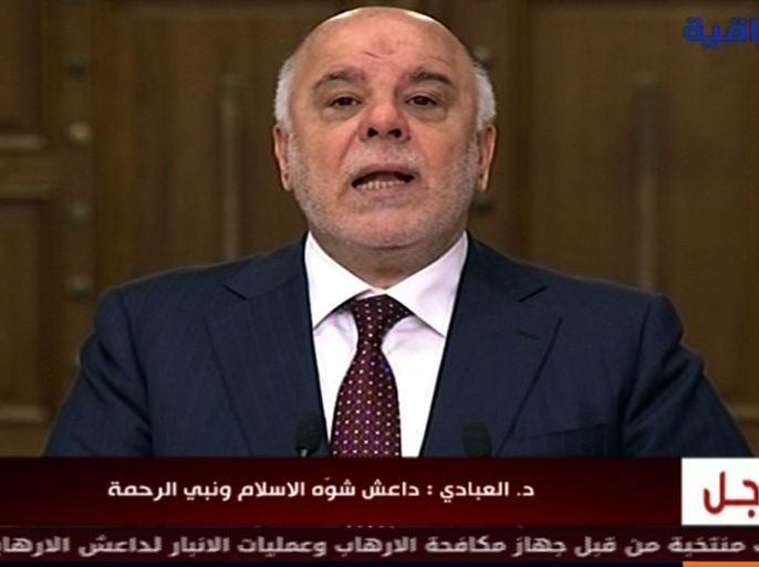 HO34 - Baghdad, -, IRAQ : An image grab taken from Iraqiya channel shows Iraqi Prime Minister Haider al-Abadi delivering a televised speech in Baghdad on December 28, 2015. Al-Abadi vowed to free the whole country from the Islamic State group in 2016, speaking after security forces retook the city of Ramadi. AFP PHOTO / IRAQI TV
