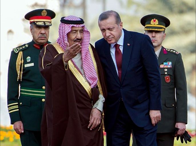 A picture provided by the Saudi Press Agency (SPA) on December 29, 2015 shows Saudi King Salman bin Abdulaziz (L) and Turkish President Recep Tayyip Erdogan walking on the red carpet during a welcoming ceremony held in the Saudi capital Riyadh. King Salman and Erdogan were expected to discuss bilateral ties and cooperation between the two countries in various fields. AFP