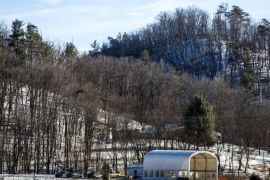 A photograph made available on 31 January 2014 shows the entrance to a National Security Agency (NSA) eavesdropping facility in the Appalachian mountains, code-named Timberline, reportedly used for domestic and international surveillance, including intercepting private phone calls, in Sugar Grove, West Virginia, USA, 29 January 2014. According to documents released by former NSA contractor Edward Snowden, the site is one of three 'signals-intelligence activity designators,' or SIGADS, based in the USA. The facility is inside the National Radio Quiet Zone, a 13,000 square mile (33,670 km) area where wireless communications such as radio, cell phone, and wi-fi are severely restricted.