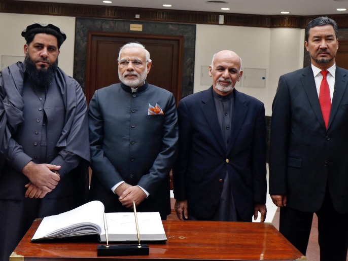 Indian Prime Minister, Narendra Modi (2 - L), poses for a picture with the Afghan President, Ashraf Ghani (2 - L), during the inauguration ceremony of the new Afghan Parliament building, in Kabul, Afghanistan, 25 December 2015. The building was constructed by India in the western part of Kabul, at a cost of 90 million US dollars. During the opening ceremony, Modi in a speech urged regional countries to help bring stability and security to Afghanistan, saying 'We know that Afghanistan's success will require the cooperation and support of each of its neighbors.' Although he did not mention Pakistan by name, Modi warned that 'Afghanistan will succeed only when terrorism no longer flows across the border; when the sanctuaries of terrorism are shut.' Modi then continued to Pakistan for a controversial visit.