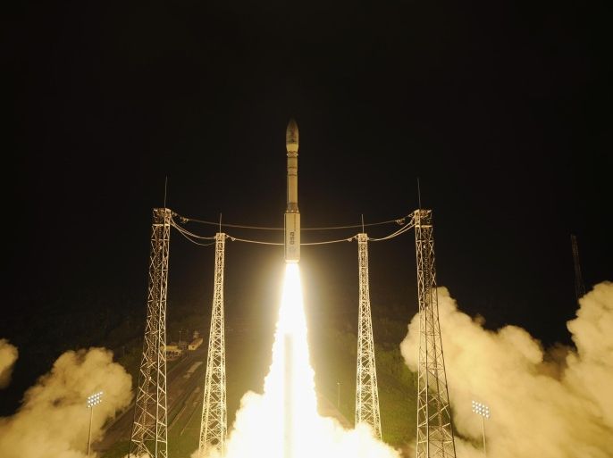 This picture taken with remote point 1 camera and provided by the European Space Agency, ESA, shows the liftoff of Vega VV06 rocket carrying LISA Pathfinder on Thursday Dec. 3, 2015 from Europe's Spaceport, Kourou French Guiana. The European Space Agency on Thursday launched a rocket carrying two cubes of gold and platinum almost a million miles from Earth so that scientists can see how they'll behave in free fall — at a cost of more than US $450 million.(Stephane Corvaja/ESA via AP)