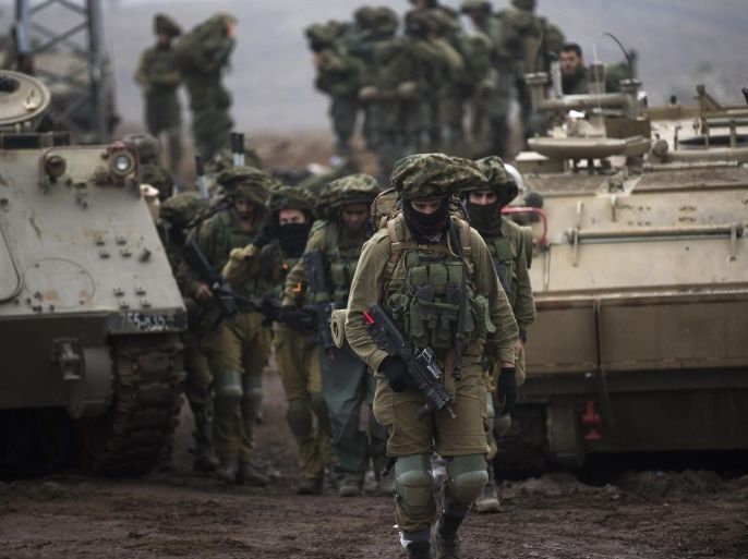 Israeli infantry soldiers from an armored unit take part in annual military training in the center of the Golan Heights, Israel, 27 October 2015. The Israeli Army on an annual basis conducts training in the Golan Heights, near the Israeli-Syrian border.