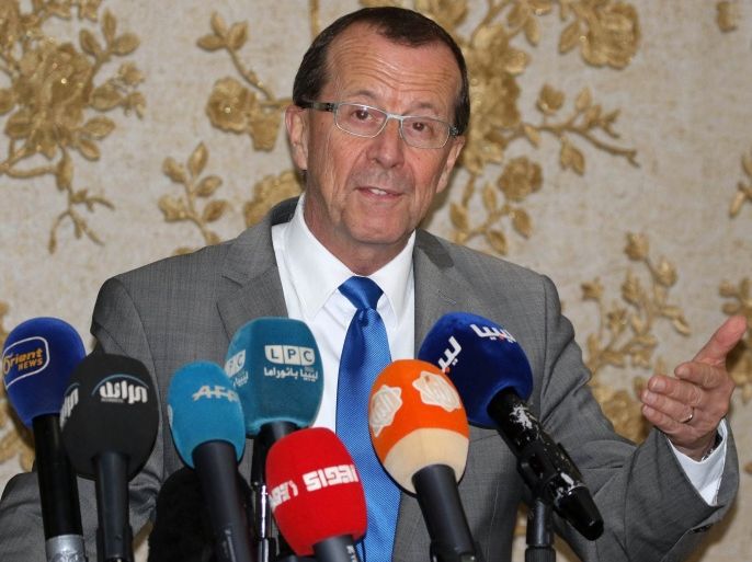MT67 - Tripoli, -, LIBYA : The UN envoy for Libya, Martin Kobler speaks during a press conference following a meeting with the members of Libya's General National Congress (GNC) on January 1, 2016 at Tripoli Metiga military airport during a visit to encourage the administration there to commit to a national unity government aimed at ending years of violence in the country. Martin Kobler, on a desperate diplomatic push to get two separate administrations to sign a power-sharing agreement, met the day before with representatives of Libya's internationally recognised government near its eastern headquarters. AFP PHOTO / MAHMUD TURKIA