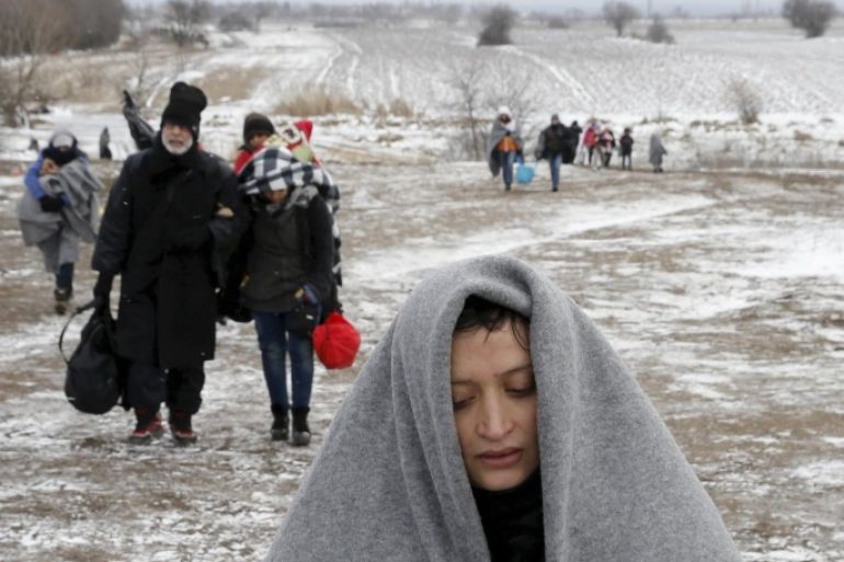 Migrants walk through a frozen field after crossing the border from Macedonia, near the village of Miratovac, Serbia, January 18, 2016. Reuters photographer Marko Djurica: "Since the beginning of the migrant crisis, my colleagues and I asked ourselves the same question: what will happen when the winter comes? We were thinking of a Balkans winter: minus 20 degrees Celsius and wind so strong that you have to walk backwards into it. Most migrants come from Syria and Iraq and they have only seen snow in the movies. I remember a young girl saying, while holding a snowball, that she didn't know snow was cold. After weeks and weeks of weather more like springtime than winter, a forecast on my phone got me packing my gear. I headed to the Serbia-Macedonia border, as down there migrants have to walk 10km in rough terrain before they can board a train to Serbia. Snow was falling and I saw a first group crossing the border. The wind was so noisy that they weren't able to talk to each other. Another group arrived with lots of kids. Many of them were crying from the cold. I was speechless. A man approached me. 'Mister how much further do we have to walk?' About 5km, I said. He turned and pointed to a group some 50 metres behind. 'One, two, three, four, five. That's my family. The one on the left who is walking in pain is my sister. She broke her leg in Aleppo last year, I am afraid for her.' I tried to calm him down, explaining that there were people here to help. I explained that they had to catch a train in Presovo and travel to Croatia, then on to Slovenia, and Austria before reaching Germany. 'Six of us have 60 euros left. Do you think it will be enough for us to finish our journey?' I was speechless again." REUTERS/Marko Djurica ATTENTION EDITORS A PICTURE AND ITS STORY "MIGRANTS STRUGGLE THROUGH BALKANS WINTER" FOR MORE IMAGES SEARCH "DJURICA MIGRANTS". TEMPLATE OUT. TPX IMAGES OF THE DAY