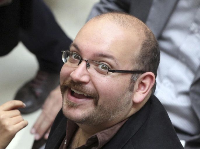 FILE - In this photo April 11, 2013 file photo, Jason Rezaian, an Iranian-American correspondent for the Washington Post, smiles as he attends a presidential campaign of President Hassan Rouhani, in Tehran, Iran.  The lawyer of the detained Washington Post journalist charged with espionage in Iran said Monday, July 20, 2015 that the next hearing in his trial likely will be the last.(AP Photo/Vahid Salemi, File)