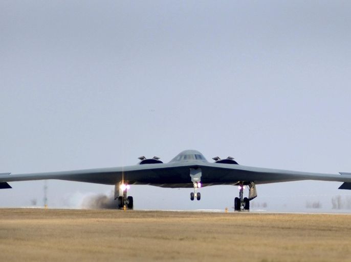 One of three Air Force Global Strike Command B-2 Spirit bombers returns to home base at Whiteman Air Force Base in Missouri, March 20, 2011 after striking targets in support of the international response which is enforcing a no-fly zone over Libya. REUTERS/Kenny Holston/U.S. Air Force photo/Handout