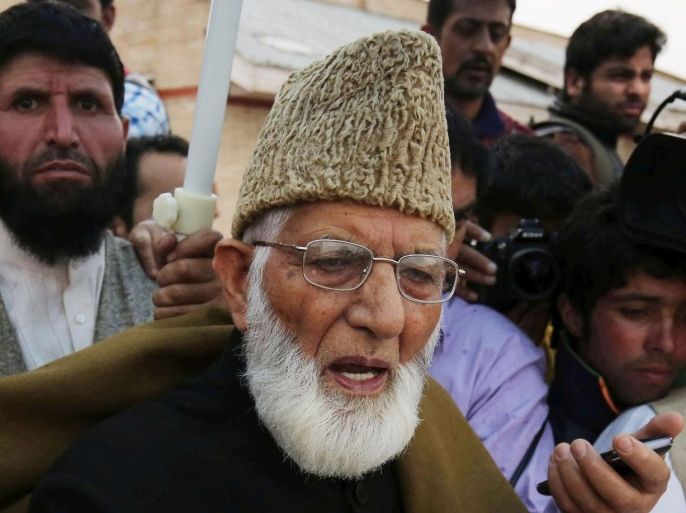 Senior separatist leader of Hardliner Faction of All Parties Hurriyat Conference Syed Ali Shah Geelani speaks to his supporters during a rally in Srinagar, the summer capital of Indian Kashmir, Wednesday, April 15, 2015. Geelani was given a rousing welcome by his supporters and leaders of his faction after his return from Indian capital.