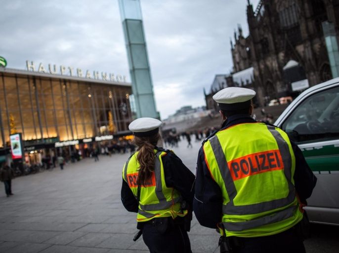 A photograph mage available on 11 January 2016 showiong German police on duty at Cologne central railway station in Cologne, Germany 10 January 2016. Two Pakistanis and one Syrian man were attacked by groups of men in central Cologne, police said 11 January 2016, in an escalation of tensions prompted by a mass sexual assault that took place in the western German city on New Year's Eve. The two Pakistani men were brought to hospital with serious injuries after as many as 20 people attacked them and four other Pakistani asylum seekers just before 7 pm (1800 GMT) on 10 January 2016 near Cologne's main train station.