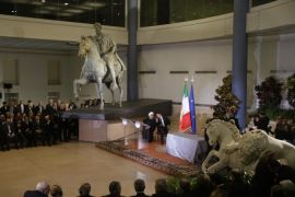 Iranian President Hassan Rouhani, left, and Italian Premier Matteo Renzi give a press conference beneath a bronze statue of Roman Emperor Marcus Aurelius following their meeting at the Campidoglio, Capitol Hill, in Rome, Monday, Jan. 25, 2016. Rouhani arrived Monday in Rome on the first state visit to Europe by an Iranian president in almost two decades, eager for foreign investments after the lifting of international sanctions. (AP Photo/Gregorio Borgia)