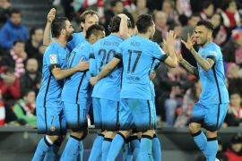 AG11726 - Bilbao, -, SPAIN : Barcelona's players celebrate their second goal during the Spanish Copa del Rey (King's Cup) football match Athletic Club de Bilbao vs FC Barcelona at the San Mames stadium in Bilbao on January 20, 2016. AFP PHOTO / ANDER GILLENEA