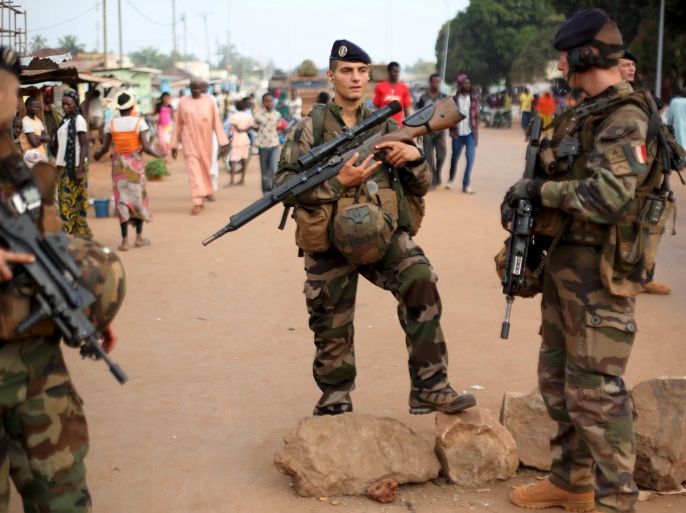 French peacekeeping soldiers patrol a street of the mostly muslim neighbourhood of PK 5 in Bangui, Central African Republic, November 25, 2015. Pope Francis said on Wednesday he wanted to offer "spiritual and material" support on his first tour of Africa, where he will address a fast-growing Catholic congregation and seek to heal divisions between Christians and Muslims. The pope arrives in Kenya later on Wednesday before travelling to Uganda, another nation targeted by Islamist militant attacks. After that he visits the Central African Republic, a country torn apart by Muslim-Christian strife. REUTERS/Siegfried Modola