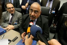 Iraq's Minister of Oil Adil Abd Al-Mahdi speaks to journalists prior to the start of a meeting of the Organization of the Petroleum Exporting Countries, OPEC, at their headquarters in Vienna, Austria, Friday, Dec. 4, 2015. (AP Photo/Ronald Zak)