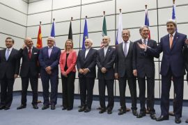 From left to right, Chinese Foreign Minister Wang Yi, French Foreign Minister Laurent Fabius, German Foreign Minister Frank Walter Steinmeier, European Union High Representative for Foreign Affairs and Security Policy Federica Mogherini, Iranian Foreign Minister Mohammad Javad Zarif, Head of the Iranian Atomic Energy Organization Ali Akbar Salehi, Russian Foreign Minister Sergey Lavrov, British Foreign Secretary Philip Hammon, U.S. Secretary of State John Kerry and U.S. Secretary of Energy Ernest Moniz pose for a group picture at the United Nations building in Vienna, Austria, Tuesday, July 14, 2015. After 18 days of intense and often fractious negotiation, world powers and Iran struck a landmark deal Tuesday to curb Iran's nuclear program in exchange for billions of dollars in relief from international sanctions ó an agreement designed to avert the threat of a nuclear-armed Iran and another U.S. military intervention in the Muslim world. (Carlos Barria, Pool Photo via AP)
