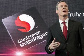 Paul Jacobs, Executive Chairman of Qualcomm, discusses the company's Snapdragon chip that is used in the newly-introduced LG G4, Tuesday, April 28, 2015 in New York. LG is making smartphones with leather backs as it seeks to distinguish its phones from Apple's iPhones and Samsung's Galaxy smartphones. (AP Photo/Mark Lennihan)