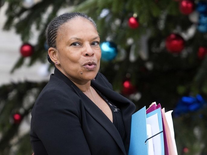 French Justice Minister Christiane Taubira walks out after the weekly cabinet meeting at the Elysee Palace, in Paris, France, Wednesday, Jan 13, 2016. (AP Photo/Jacques Brinon)