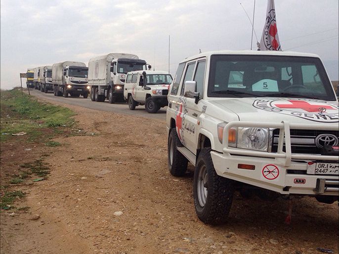 epa05097292 A handout image dated 11 January 2016 made available by the International Committee of the Red Cross, showing a Red Cross aid convoy on its way to the besieged city of Madaya, Syria. A convoy of trucks carrying food and medical aid arrived at a government checkpoint outside the besieged Syrian town of Madaya, where Doctors without Borders (MSF) says almost 30 people have died of starvation. The aid convoy would not cross into Madaya until a parallel convoy was able to enter two government-held Shiite villages besieged by Islamist rebels in north-western Syria. Red Crescent said some 330 tonnes of food and medical aid were being sent to Madaya, enough to last for about 40 days. EPA/HANDOUT BEST QUALITY AVAILABLE HANDOUT EDITORIAL USE ONLY/NO SALES
