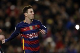 FC Barcelona's Argentinian striker Lionel Messi celebrates after scoring by penalty kick against Athletic Bilbao during to the Spanish Primera Division soccer match at Camp Nou stadium in Barcelona, northeastern Spain, 17 January 2016.