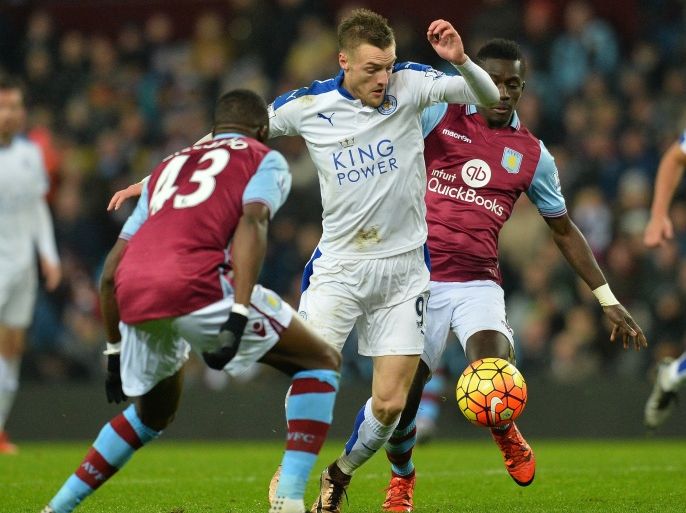 REB5457 - Birmingham, West Midlands, UNITED KINGDOM : Leicester City's English striker Jamie Vardy (C) vies with Aston Villa's French midfielder Aly Cissokho (L) and Aston Villa's Senegalese midfielder Idrissa Gueye during the English Premier League football match between Aston Villa and Leicester City at Villa Park in Birmingham, central England on January 16, 2016. The match ended in a draw at 1-1. AFP PHOTO / GLYN KIRK