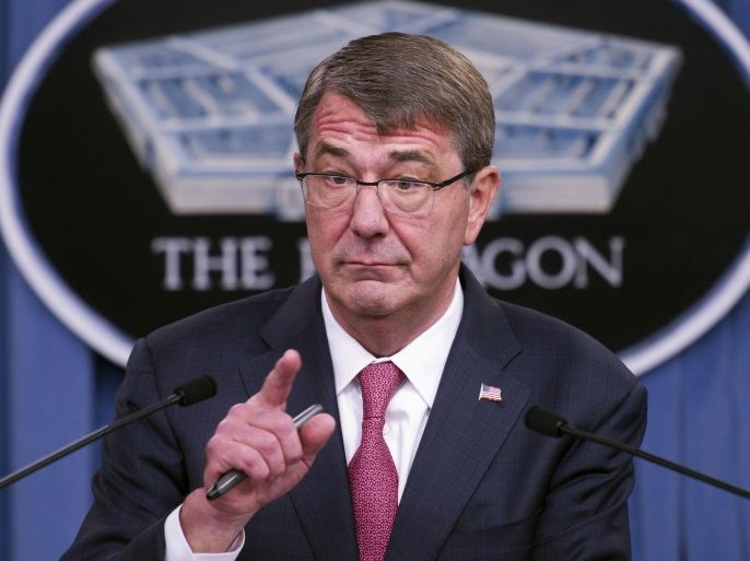 Defense Secretary Ash Carter gestures during a news conference at the Pentagon, Thursday, Dec. 3, 2015, to announce that he has ordered the military to open all combat jobs to women, and is giving the armed services until Jan. 1 to submit plans to make the historic change. (AP Photo/Cliff Owen)