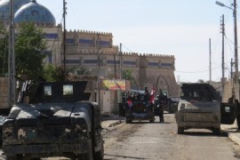 STR06 - Ramadi, -, IRAQ : Iraqi forces secure an area near the Grand Mosque in central Ramadi, the capital of Iraq's Anbar province, on January 8, 2016, after retaking the city from Islamic State (IS) group jihadists. Iraqi forces pushed out of central Ramadi on January 1, 2016 to extend their grip on the city, sweeping neighbourhoods for pockets of jihadists to flush out and trapped civilians to evacuate. AFP PHOTO / STR
