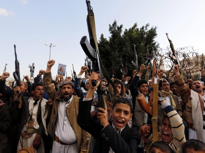 Houthi supporters hold weapons aloft and shout slogans during a rally protesting against the US and British support for the Saudi-led military offensive in the war-torn country, in Sana'a, Yemen, 29 January 2016. According to reports, thousands of Houthi supporters took to the streets of Sana'a to protest against the US and UK support to the Saudi-led military coalition, fighting Houthi rebels and allied army forces in order to restore the internationally recognized government of Yemeni President Abdo Rabbo Mansour Hadi.