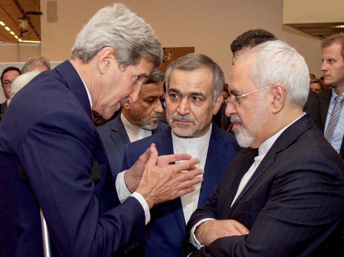 U.S. Secretary of State John Kerry (L) speaks with Hossein Fereydoun (C), the brother of Iranian President Hassan Rouhani, and Iranian Foreign Minister Javad Zarif (R), before the Secretary and Foreign Minister addressed an international press corps gathered at the Austria Center in Vienna, Austria, July 14, 2015. Iran and six major world powers reached a nuclear deal on Tuesday, capping more than a decade of on-off negotiations with an agreement that could potentially transform the Middle East, and which Israel called an "historic surrender". REUTERS/US State Department/Handout via Reuters ATTENTION EDITORS - THIS PICTURE WAS PROVIDED BY A THIRD PARTY. REUTERS IS UNABLE TO INDEPENDENTLY VERIFY THE AUTHENTICITY, CONTENT, LOCATION OR DATE OF THIS IMAGE. FOR EDITORIAL USE ONLY. NOT FOR SALE FOR MARKETING OR ADVERTISING CAMPAIGNS. THIS PICTURE WAS PROCESSED BY REUTERS TO ENHANCE QUALITY. AN UNPROCESSED VERSION WILL BE PROVIDED SEPARATELY.