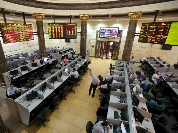 Traders work at the Egyptian stock exchange in Cairo, Egypt in this August 23, 2015 file photo. Egypt?s central bank monetary policy committee is expected this week to meet to set benchmark interest rates in their first rate decision since Tarek Amer took over as governor. REUTERS/Mohamed Abd El Ghany/FilesGLOBAL BUSINESS WEEK AHEAD PACKAGE - SEARCH "BUSINESS WEEK AHEAD DEC 14" FOR ALL IMAGES