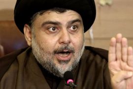 Shiite cleric Muqtada al-Sadr speaks during a press conference in the Shiite holy city of Najaf, 100 miles (160 kilometers) south of Baghdad, Iraq, Tuesday, Dec. 29, 2015. Al-Sadr congratulated the Iraqi people a day after Iraqi security forces regain control of Ramadi. (AP Photo/Karim Kadim)
