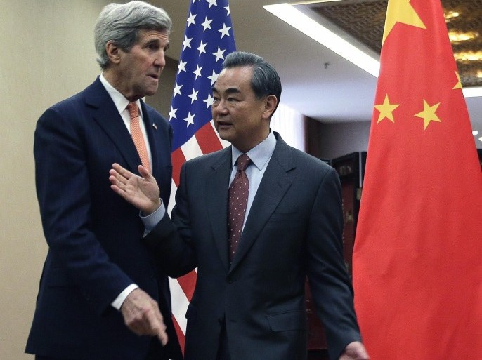 US Secretary of State John Kerry (L) meets with Chinese Foreign Minister Wang Yi before their bilateral meeting at the Ministry of Foreign Affairs in Beijing, China, 27 January 2016.