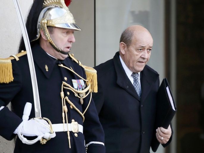 French Defence Minister Jean-Yves Le Drian leaves after the first weekly cabinet meeting of the year at the Elysee Palace in Paris, France, January 4, 2016. REUTERS/Gonzalo Fuentes