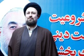 (FILE) A file photo dated 18 December 2015 showing Iranian Hassan Khomeini, the grandson of late Iranian supreme leader Ayatollah Ruhollah Khomeini, standing next to a poster of Iranian President Hassan Rowhani, as he arrives to registers his candidacy at the Interior Ministry during the registration for Iran's upcoming election for Assembly of Experts, in Tehran, Iran. Khomeini, a grandson of late Iranian revolutionary leader ayatollah Ruhollah Khomeini has reportedly been disqualified from next month's parliamentary elections media reports state 26 January 2016. Hassan Khomeini, 43, and believed to be reform-oriented was seeking election to the Council of Experts on February 26. But his son Ahmad posted on Instagram that Hassan had been disqualified. There was no official confirmation of the news. Hassan is the most prominent among the late ayatollah's 15 grandchildren.