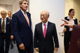U.S. Secretary of State John Kerry meets with IAEA Director General Yukiya Amano after the IAEA verified that Iran has met all conditions under the nuclear deal, in Vienna, Saturday Jan. 16, 2016. (Kevin Lamarque/Pool via AP)