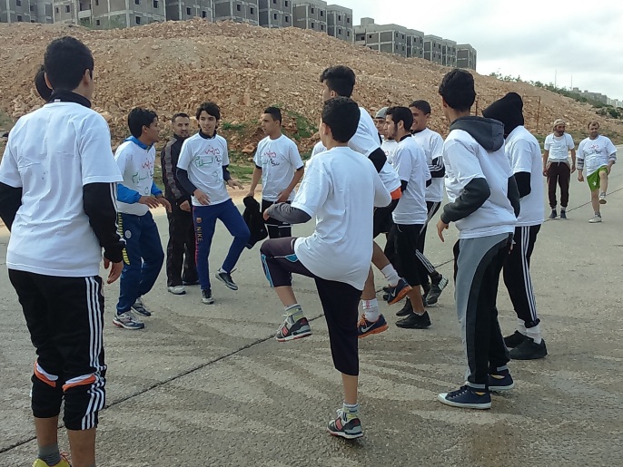 شارك بالتظاهرة ممثلون عن أندية رياضية بمدن ومناطق الجبل الأخضر شرقي ليبيا (الجزيرة نت)