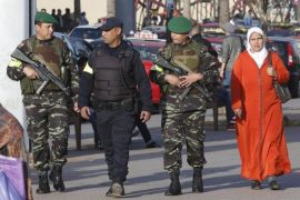 In this photo dated Tuesday, Dec. 29, 2015 Moroccan soldiers patrol the United Nations square in Casablanca, Morocco. Moroccan intelligence services are playing a central role in Europe's effort to uncover terrorist threats _ and doubling down with their own security ahead of New Year's festivities. (AP Photo/Abdeljalil Bounhar)