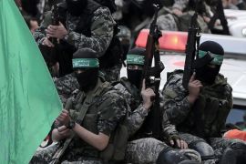 Palestinian fighters of the Izz Al-Din al-Qassam brigades, the military wing of Palestinian Hamas organization, attend the funeral of seven bodies of Al-Qassam fighters during their funeral in the east of Gaza City on, 29 January 2016. Seven fighters ofrom Al-Qassam were killed after a tunnel built for fighting Israel collapsed in the Gaza Strip.