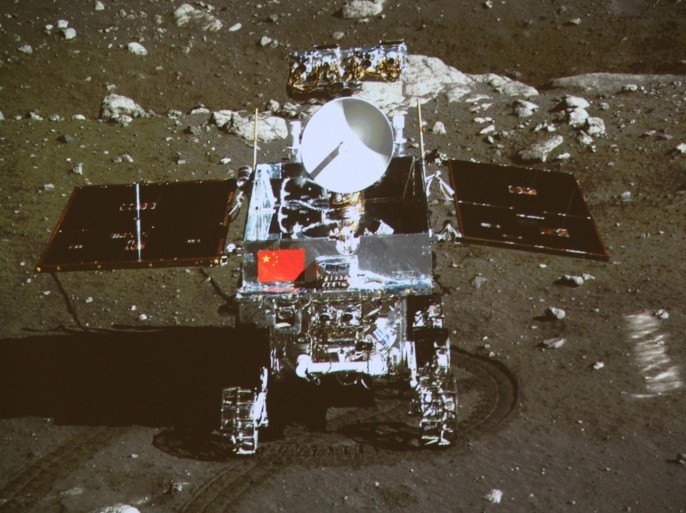 FILE - In this Dec. 15, 2013 file image taken by the on-board camera of the lunar probe Chang'e-3 and made off the screen of the Beijing Aerospace Control Center in Beijing. China's first moon rover "Yutu" - or Jade Rabbit - is on the lunar surface in the area known as Sinus Iridum (Bay of Rainbows). China has restored communications with its space program's troubled "Jade Rabbit" moon rover, but engineers are still working to fix its mechanical problems, state media said Thursday, Feb 13, 2014. (AP Photo/Xinhua, File) NO SALES