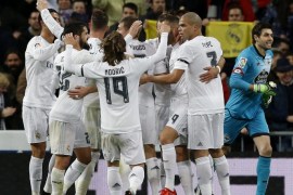 Real Madrid's players celebrate after scoring the opening goal against Deportivo Coruna during the Spanish Liga Primera Divison soccer match played at Santiago Bernabeu stadium, in Madrid, Spain, 09 January 2016.