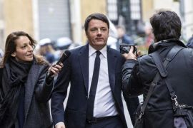 Italian Premier Matteo Renzi (C) arrives at the headquarters of the Foreign Press club to hold a press conference on the second anniversary of him becoming premier, Rome, Italy, 22 February 2016. Renzi was elected into office on 22 February 2014.