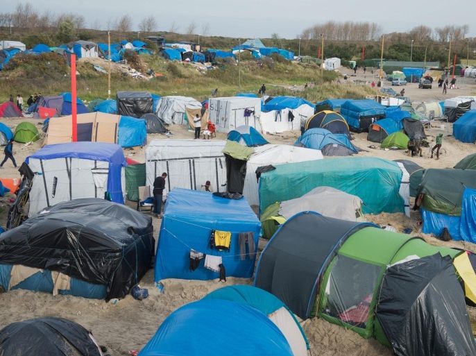 A general view of the camp called 'The Jungle' in the port of Calais, France, 08 November 2015. Currently the camp in Calais is housing around 1500 migrants who are looking to cross the English Channel to Britain. Among the migrants of the 'Jungle' are refugees and asylum seekers from Afghanistan, Darfur, Syria, Iraq and Eritrea.